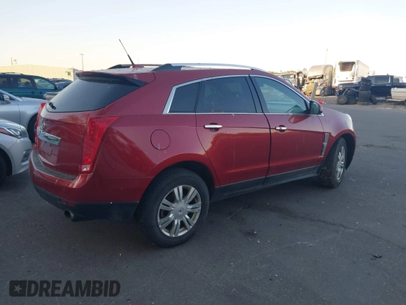 2011 Cadillac SRX Luxury Collection z VIN 3GYFNAEY2BS517192, wystawiony jako IAAI lot #42494074 z przebiegiem 191 094 mil mil oraz . Historia ofert i sprzedaży dostępna na DreamBid. Obrazek 4.