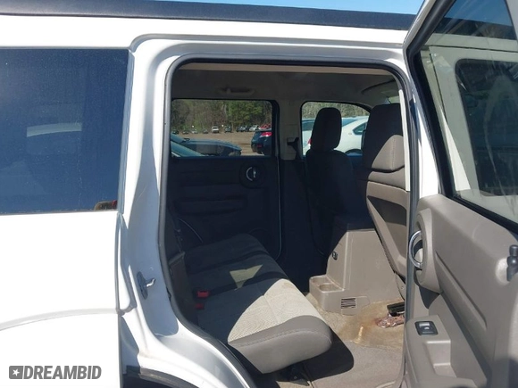 2009 Dodge Nitro SE with VIN 1D8GT28K19W518279, listed as a IAAI auction lot 41855238 with 186,607 mi miles. Bid and sale history available at carsss.com. Image 8.