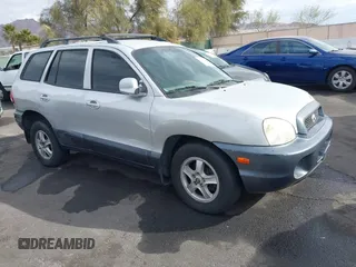 2002 Hyundai Santa Fe GLS z VIN KM8SC13D62U322962, wystawiony jako IAAI lot #41437333 z przebiegiem 183 711 mil mil oraz . Historia ofert i sprzedaży dostępna na DreamBid. Obrazek 1.