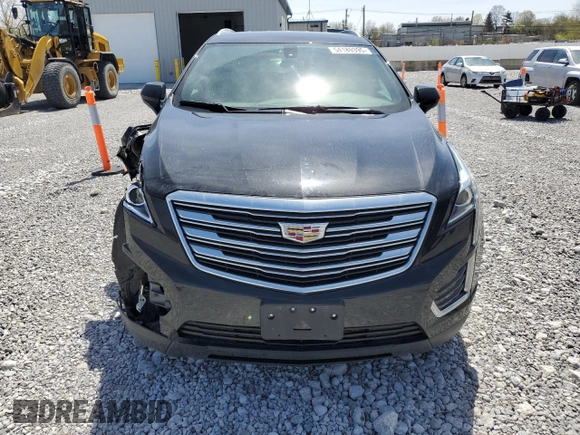 2017 Cadillac XT5 FWD with VIN 1GYKNARS2HZ131243, listed as a Copart auction lot 54189395 with 134,324 mi miles and Salvage Title. Bid and sale history available at DreamBid. Image 5.