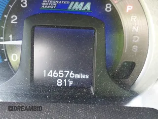 2010 Honda Insight EX with VIN JHMZE2H76AS000837, listed as a IAAI auction lot 42103333 with 146,576 mi miles and . Bid and sale history available at DreamBid. Image 15.