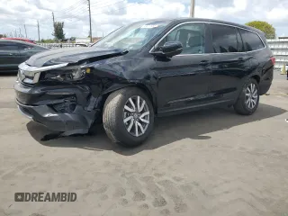 2022 Honda Pilot EX-L with VIN 5FNYF5H51NB010107, listed as a Copart auction lot 53521565 with 25,477 mi miles and Salvage title. Bid and sale history available at DreamBid. Image 1.