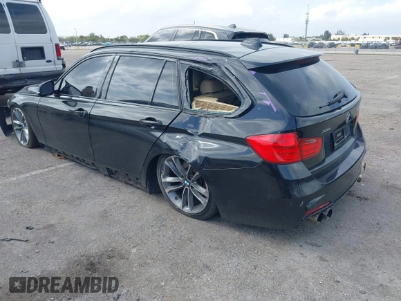 2014 BMW 3 Series 328i xDrive with VIN WBA3G7C57EKN37319, listed as a IAAI auction lot 41699235 with 93,671 mi miles and . Bid and sale history available at carsss.com. Image 3.
