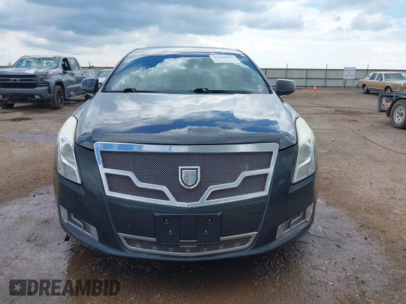 2013 Cadillac XTS Platinum z VIN 2G61V5S32D9102537, wystawiony jako IAAI lot #42230895 z przebiegiem 120 810 mil mil oraz . Historia ofert i sprzedaży dostępna na DreamBid. Obrazek 12.