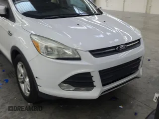 2016 Ford Escape SE z VIN 1FMCU0GX3GUC30456, wystawiony jako IAAI lot #42303600 z przebiegiem 99 033 mil mil oraz . Historia ofert i sprzedaży dostępna na DreamBid. Obrazek 1.