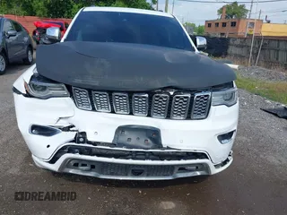 2017 Jeep Grand Cherokee Overland with VIN 1C4RJFCT6HC880306, listed as a IAAI auction lot 42534987 with 97,976 mi miles and . Bid and sale history available at DreamBid. Image 6.