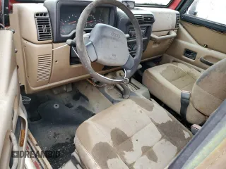 2002 Jeep Wrangler SE with VIN 1J4FA29P32P706533, listed as a Copart auction lot 43709055 with Not Provided miles and Salvage Title. Bid and sale history available at DreamBid. Image 8.