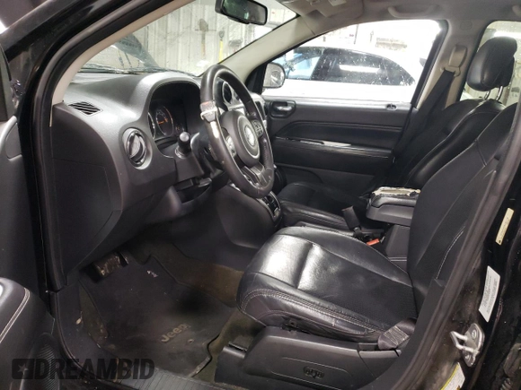 2014 Jeep Compass Latitude with VIN 1C4NJCEA2ED887736, listed as a Copart auction lot 51675375 with 103,403 mi miles and Salvage Title. Bid and sale history available at carsss.com. Image 7.