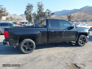 2018 Chevrolet Silverado 1500 Work Truck with VIN 1GCVKNEH3JZ247828, listed as a IAAI auction lot 41537573 with 134,684 mi miles. Bid and sale history available at carsss.com. Image 13.