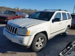 2007 Jeep Grand Cherokee Laredo with VIN 1J8GR48K37C525797, listed as a IAAI auction lot 41929118 with 244,092 mi miles. Bid and sale history available at carsss.com. Image 2.