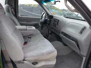 1998 Ford F-150 with VIN 1FTYF17W0WNC12927, listed as a IAAI auction lot 42621641 with 251,079 mi miles and . Bid and sale history available at DreamBid. Image 5.