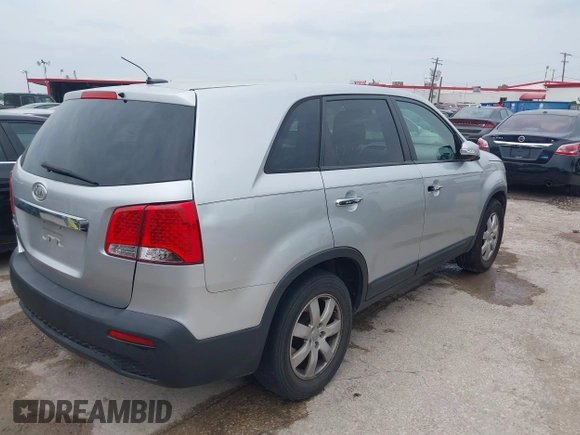 2012 Kia Sorento LX with VIN 5XYKT3A14CG272381, listed as a IAAI auction lot 42077775 with 165,538 mi miles. Bid and sale history available at carsss.com. Image 4.