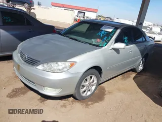 2006 Toyota Camry LE z VIN 4T1BF30K96U115963, wystawiony jako IAAI lot #41616833 z przebiegiem 237 404 mil mil oraz . Historia ofert i sprzedaży dostępna na DreamBid. Obrazek 2.