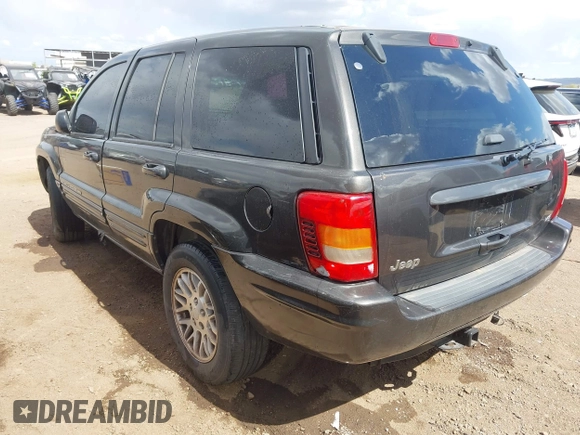 2004 Jeep Grand Cherokee Limited with VIN 1J8GX58NX4C422930, listed as a IAAI auction lot 41935711 with 223,844 mi miles and . Bid and sale history available at DreamBid. Image 3.