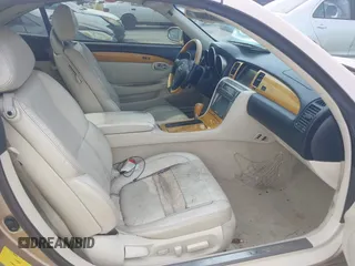 2004 Lexus SC 430 with VIN JTHFN48Y440061059, listed as a IAAI auction lot 42340921 with 117,264 mi miles and . Bid and sale history available at DreamBid. Image 5.