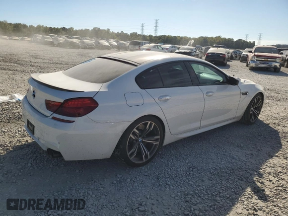 2015 BMW M6 z VIN WBS6C9C58FD467867, wystawiony jako Copart lot #75966844 z przebiegiem 94 102 mil mil oraz Szkoda całkowita • Salvage title. Historia ofert i sprzedaży dostępna na DreamBid. Obrazek 3.