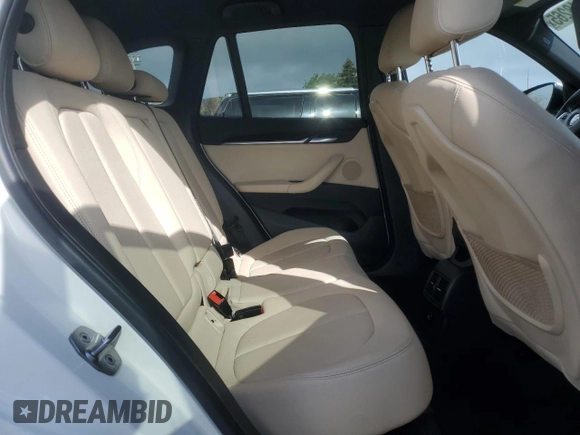 2017 BMW X1 sDrive28i with VIN WBXHU7C33H5H32827, listed as a Copart auction lot 50348265 with 117,412 mi miles and Salvage Title. Bid and sale history available at carsss.com. Image 11.