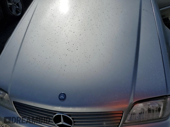 1999 Mercedes-Benz SL-Class with VIN WDBFA68F0XF176572, listed as a Copart auction lot 74715254 with 0 mi miles and Salvage Title. Bid and sale history available at carsss.com. Image 11.