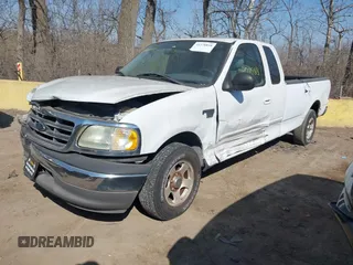 2003 Ford F-150 with VIN 2FTRX17L63CA31923, listed as a IAAI auction lot 41778818 with 107,600 mi miles and . Bid and sale history available at DreamBid. Image 17.