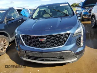 2021 Cadillac XT4 FWD Premium Luxury z VIN 1GYFZCR48MF056210, wystawiony jako Copart lot #73706384 z przebiegiem Nie podano mil oraz Nie do naprawy • Non repairable. Historia ofert i sprzedaży dostępna na DreamBid. Obrazek 5.