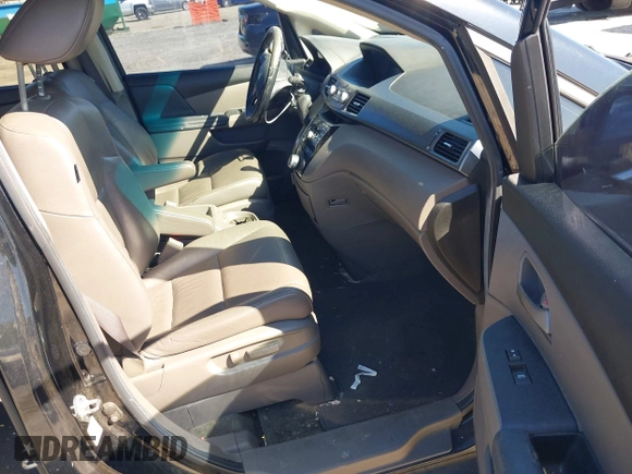2011 Honda Odyssey EX-L with VIN 5FNRL5H67BB087064, listed as a IAAI auction lot 42326427 with 177,795 mi miles and . Bid and sale history available at DreamBid. Image 5.