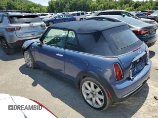 2005 MINI Convertible z VIN WMWRF33435TF60350, wystawiony jako Copart lot #50545005 z przebiegiem 91 078 mil mil oraz Szkoda całkowita • Salvage title. Historia ofert i sprzedaży dostępna na DreamBid. Obrazek 2.
