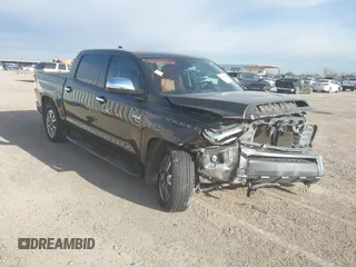 2020 Toyota Tundra Platinum z VIN 5TFGY5F16LX268034, wystawiony jako IAAI lot #41204808 z przebiegiem 80 218 mil mil oraz . Historia ofert i sprzedaży dostępna na DreamBid. Obrazek 1.