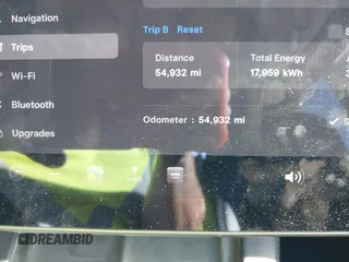 2021 Tesla Model Y Long Range with VIN 5YJYGAEE1MF149887, listed as a IAAI auction lot 42032104 with 54,932 mi miles. Bid and sale history available at carsss.com. Image 15.