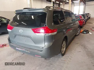 2011 Toyota Sienna LE AAS with VIN 5TDKK3DC1BS073077, listed as a IAAI auction lot 41916750 with 176,822 mi miles. Bid and sale history available at carsss.com. Image 4.