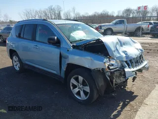 2013 Jeep Compass Latitude with VIN 1C4NJDEB2DD263920, listed as a IAAI auction lot 41832542 with 128,018 mi miles. Bid and sale history available at carsss.com. Image 1.