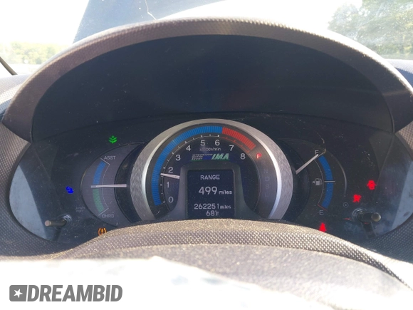 2010 Honda Insight LX with VIN JHMZE2H52AS032697, listed as a IAAI auction lot 42255794 with 262,251 mi miles and . Bid and sale history available at DreamBid. Image 7.