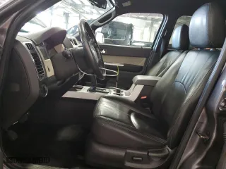 2010 Mercury Mariner Premier with VIN 4M2CN9H70AKJ24788, listed as a Copart auction lot 63035164 with 153,957 mi miles and Salvage Title. Bid and sale history available at carsss.com. Image 7.