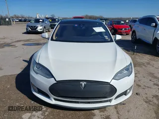 2015 Tesla Model S 85D with VIN 5YJSA1H48FF082038, listed as a IAAI auction lot 41712242 with 58,297 mi miles. Bid and sale history available at carsss.com. Image 12.