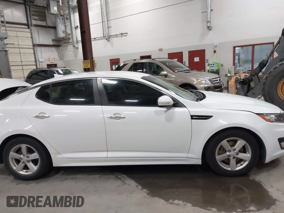 2015 Kia Optima LX with VIN KNAGM4A74F5587995, listed as a IAAI auction lot 41974745 with 206,627 mi miles. Bid and sale history available at carsss.com. Image 13.