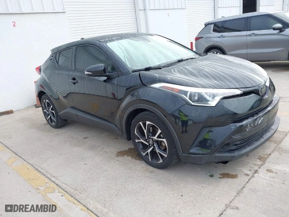 2019 Toyota C-HR XLE with VIN NMTKHMBX2KR094898, listed as a IAAI auction lot 41940883 with 94,351 mi miles. Bid and sale history available at carsss.com. Image 1.