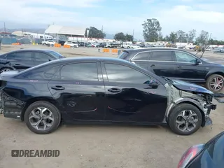 2019 Kia Forte LXS with VIN 3KPF24AD0KE109792, listed as a IAAI auction lot 42242300 with 57,680 mi miles and . Bid and sale history available at DreamBid. Image 14.