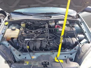 2006 Ford Focus S z VIN 1FAFP34N96W102857, wystawiony jako IAAI lot #42476971 z przebiegiem 125 744 mil mil oraz . Historia ofert i sprzedaży dostępna na DreamBid. Obrazek 10.