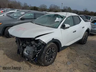 2022 Hyundai Santa Cruz SEL with VIN 5NTJB4AE7NH037039, listed as a IAAI auction lot 41472621 with 77,323 mi miles. Bid and sale history available at carsss.com. Image 16.