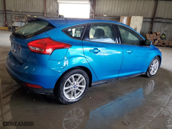 2015 Ford Focus SE with VIN 1FADP3K21FL233119, listed as a Copart auction lot 51106225 with 104,160 mi miles and Salvage Title. Bid and sale history available at carsss.com. Image 3.