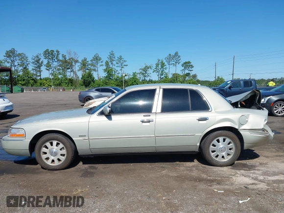 2004 Mercury Grand Marquis LS Premium z VIN 2MEHM75W64X681851, wystawiony jako IAAI lot #42389437 z przebiegiem 118 153 mil mil oraz . Historia ofert i sprzedaży dostępna na DreamBid. Obrazek 14.