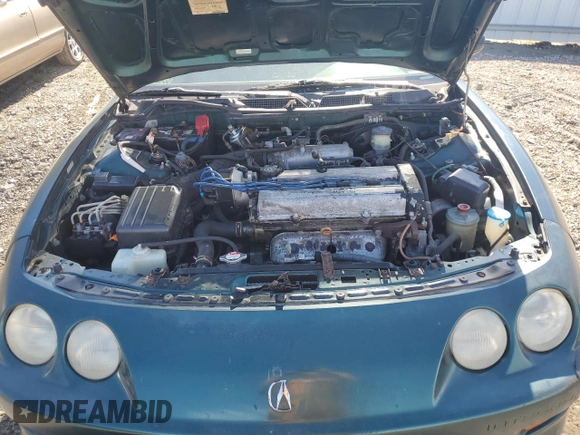 2000 Acura Integra LS z VIN JH4DB765XYS001338, wystawiony jako Copart lot #74884714 z przebiegiem 179 441 mil mil oraz Szkoda całkowita • Salvage title. Historia ofert i sprzedaży dostępna na DreamBid. Obrazek 11.