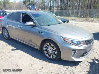 2018 Kia Optima SX with VIN 5XXGV4L26JG187281, listed as a IAAI auction lot 41887939 with 124,782 mi miles. Bid and sale history available at carsss.com. Image 1.