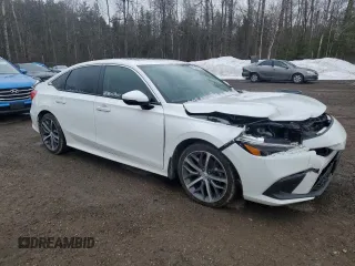 2023 Honda Civic Sedan Touring with VIN 2HGFE1F9XPH001994, listed as a Copart auction lot 49402325 with 106,495 mi miles and Salvage Title. Bid and sale history available at carsss.com. Image 4.