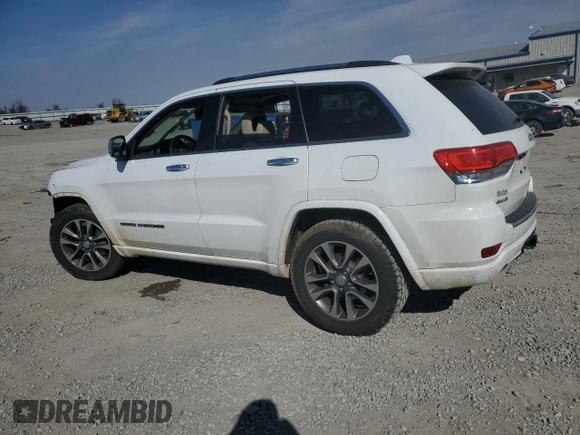 2017 Jeep Grand Cherokee Overland with VIN 1C4RJFCG9HC633011, listed as a Copart auction lot 48596125 with 0 mi miles and Salvage Title. Bid and sale history available at carsss.com. Image 2.