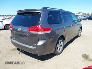 2011 Toyota Sienna LE AAS with VIN 5TDKK3DC0BS055346, listed as a IAAI auction lot 41834715 with 124,847 mi miles. Bid and sale history available at carsss.com. Image 4.