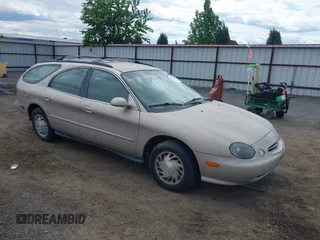 1998 Ford Taurus with VIN 1FAFP57U8WG275844, listed as a IAAI auction lot 42426107 with 318,654 mi miles and . Bid and sale history available at DreamBid. Image 1.