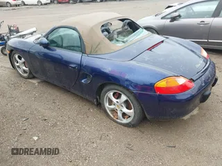 2002 Porsche Boxster z VIN WP0CA29822U622397, wystawiony jako IAAI lot #42368183 z przebiegiem 189 696 mil mil oraz . Historia ofert i sprzedaży dostępna na DreamBid. Obrazek 3.