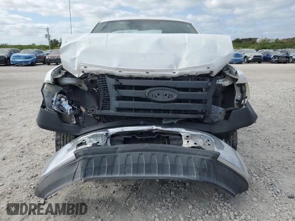 2011 Ford F-150 XL with VIN 1FTMF1CM6BFB39215, listed as a Copart auction lot 51974565 with 318,520 mi miles and Salvage Title. Bid and sale history available at DreamBid. Image 5.