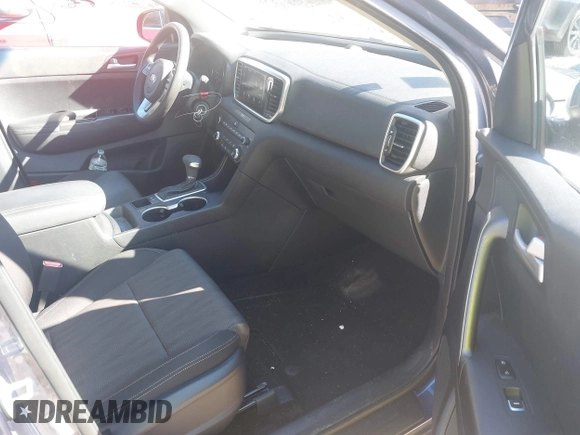 2020 Kia Sportage LX with VIN KNDPM3AC2L7656080, listed as a IAAI auction lot 41880254 with 34,023 mi miles and . Bid and sale history available at DreamBid. Image 5.