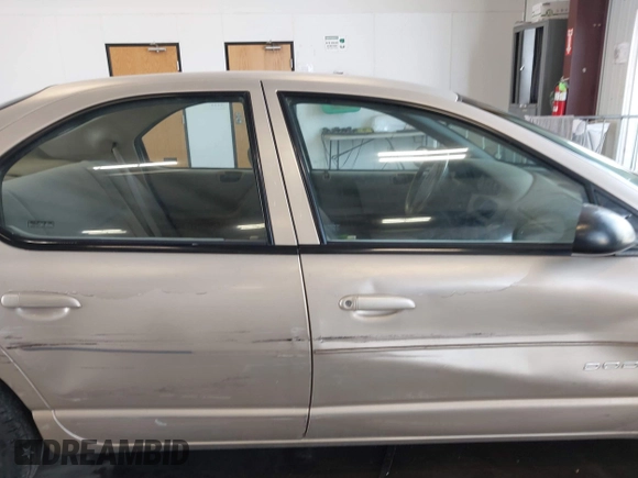 1999 Dodge Stratus z VIN 1B3EJ46X6XN587172, wystawiony jako IAAI lot #42472893 z przebiegiem 154 338 mil mil oraz . Historia ofert i sprzedaży dostępna na DreamBid. Obrazek 13.